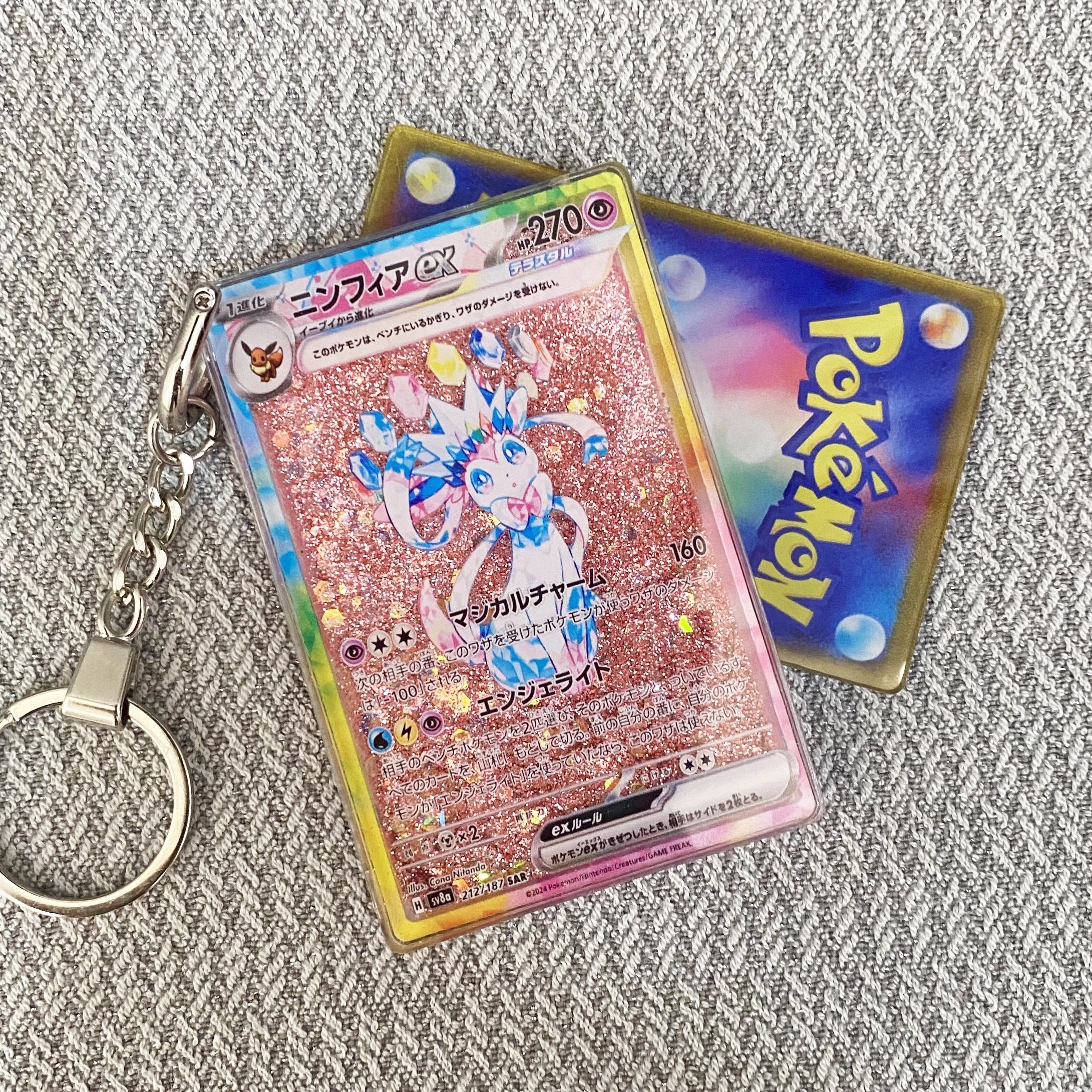 Sylveon-EX Pokemon Cards Premium Liquid Motion Keychain,A Perfect Gift for Pokemon fans